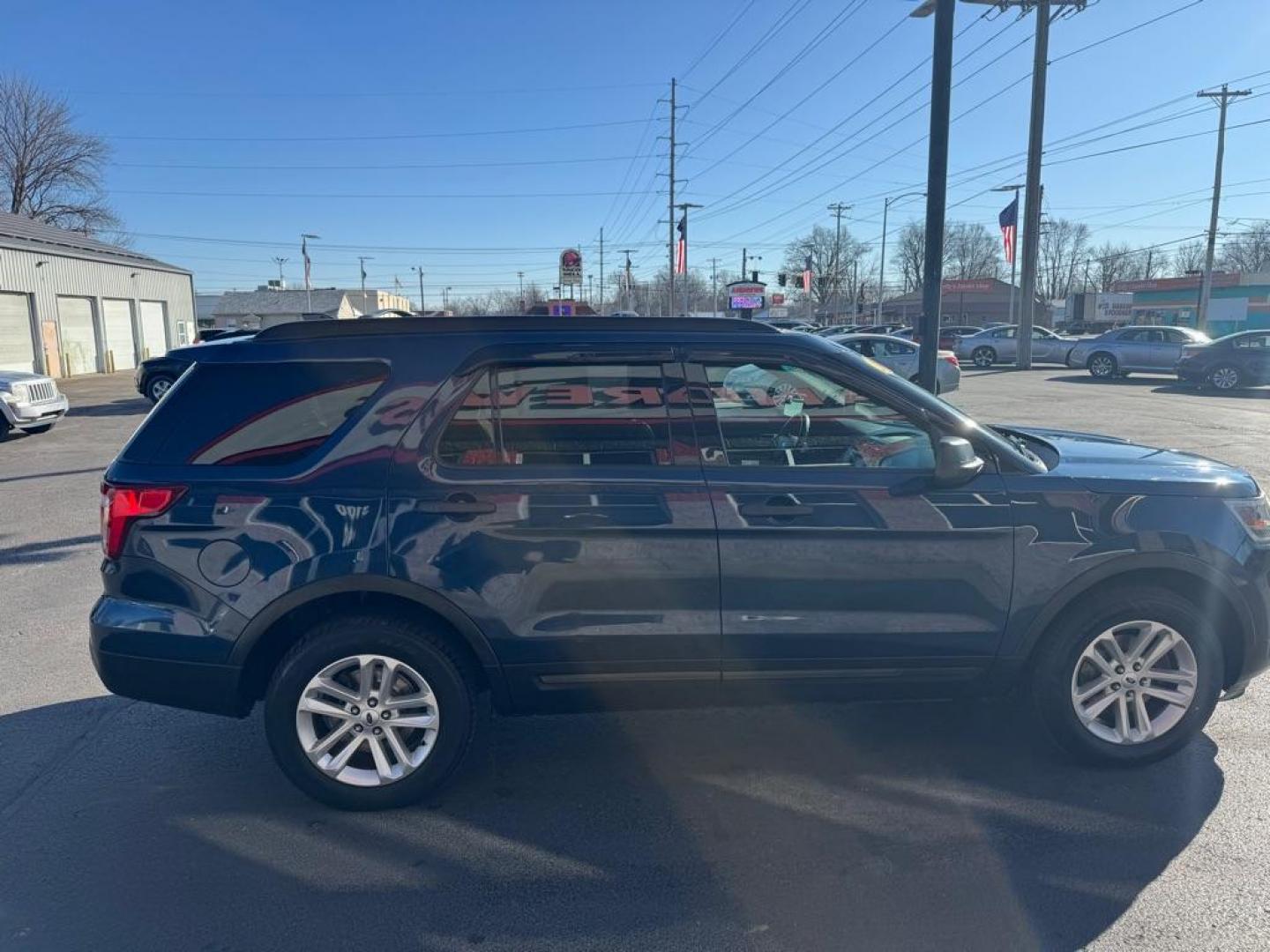 2016 BLUE FORD EXPLORER (1FM5K8BH8GG) with an 2.3L engine, Automatic transmission, located at 3100 Covert Avenue, Evansville, IN, 47714, (812) 473-4492, 37.955418, -87.512238 - Photo#2