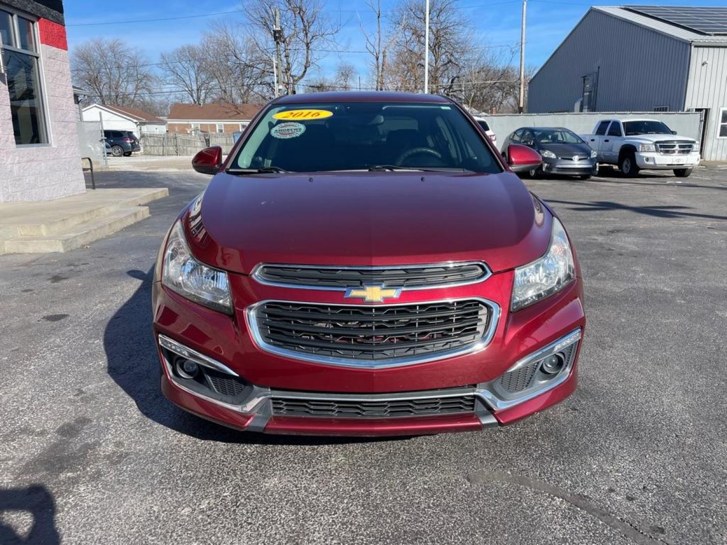 2016 RED CHEVROLET CRUZE LIMITED LT (1G1PE5SB9G7) with an 1.4L engine, Automatic transmission, located at 3100 Covert Avenue, Evansville, IN, 47714, (812) 473-4492, 37.955418, -87.512238 - Photo#1