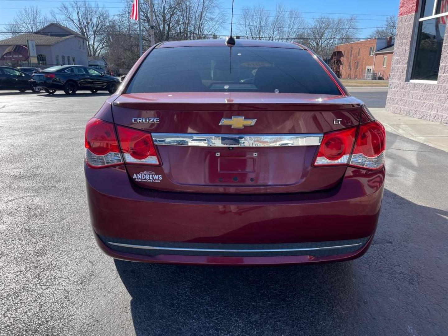 2016 RED CHEVROLET CRUZE LIMITED LT (1G1PE5SB9G7) with an 1.4L engine, Automatic transmission, located at 3100 Covert Avenue, Evansville, IN, 47714, (812) 473-4492, 37.955418, -87.512238 - Photo#3