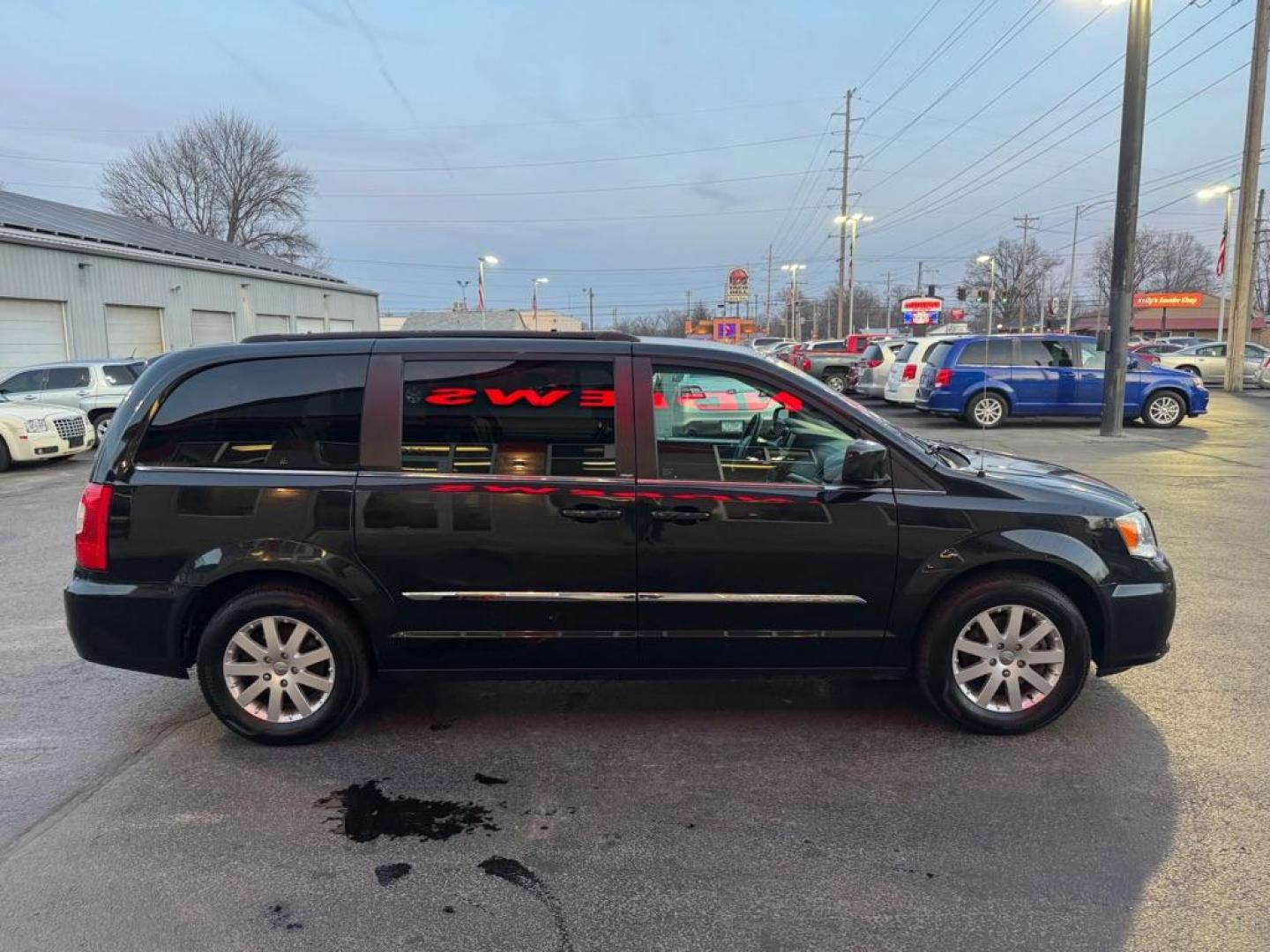 2014 BLACK CHRYSLER TOWN and COUNTRY TOURING (2C4RC1BGXER) with an 3.6L engine, Automatic transmission, located at 3100 Covert Avenue, Evansville, IN, 47714, (812) 473-4492, 37.955418, -87.512238 - Photo#2