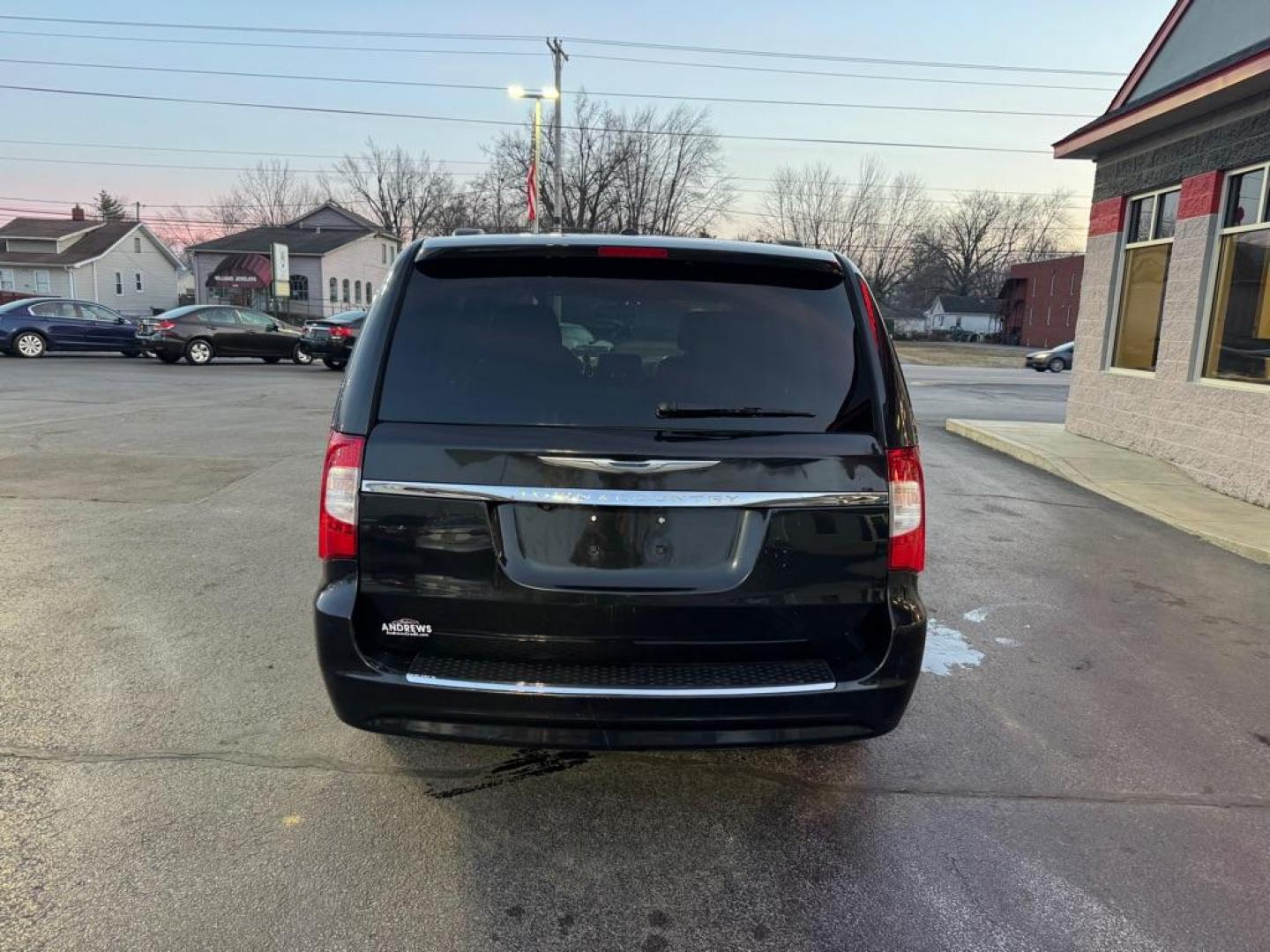 2014 BLACK CHRYSLER TOWN and COUNTRY TOURING (2C4RC1BGXER) with an 3.6L engine, Automatic transmission, located at 3100 Covert Avenue, Evansville, IN, 47714, (812) 473-4492, 37.955418, -87.512238 - Photo#3