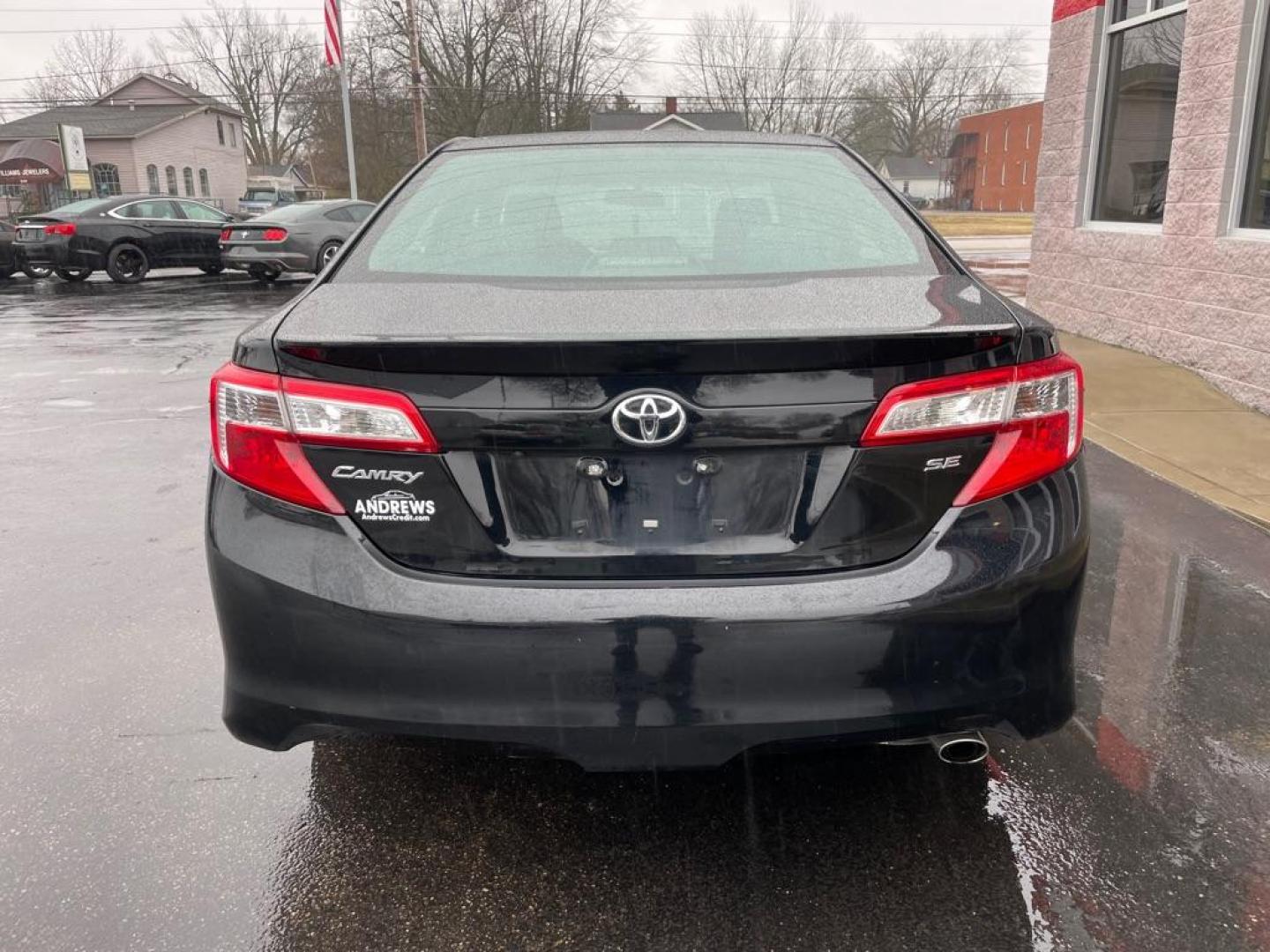 2014 BLACK TOYOTA CAMRY L (4T1BF1FK1EU) with an 2.5L engine, Automatic transmission, located at 3100 Covert Avenue, Evansville, IN, 47714, (812) 473-4492, 37.955418, -87.512238 - Photo#3