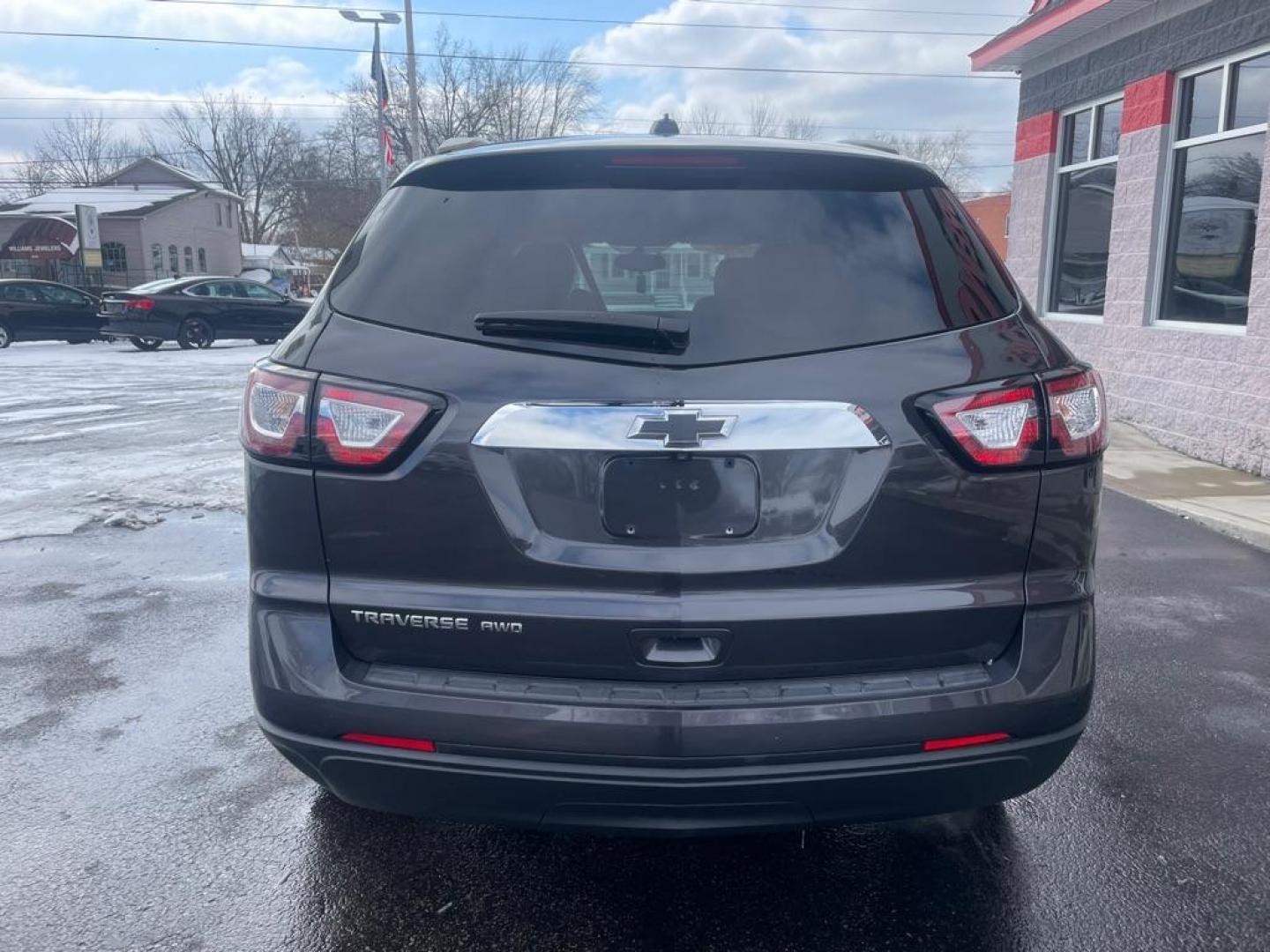 2017 GRAY CHEVROLET TRAVERSE LS (1GNKVFKD6HJ) with an 3.6L engine, Automatic transmission, located at 3100 Covert Avenue, Evansville, IN, 47714, (812) 473-4492, 37.955418, -87.512238 - Photo#3