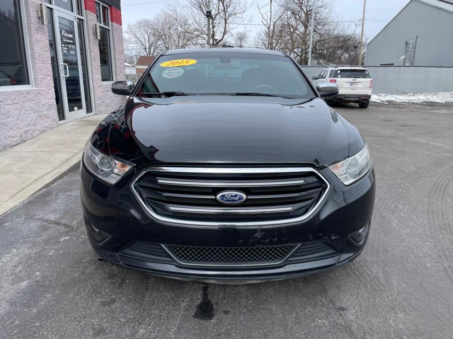 2015 BLACK FORD TAURUS LIMITED (1FAHP2F84FG) with an 3.5L engine, Automatic transmission, located at 3100 Covert Avenue, Evansville, IN, 47714, (812) 473-4492, 37.955418, -87.512238 - Photo#1